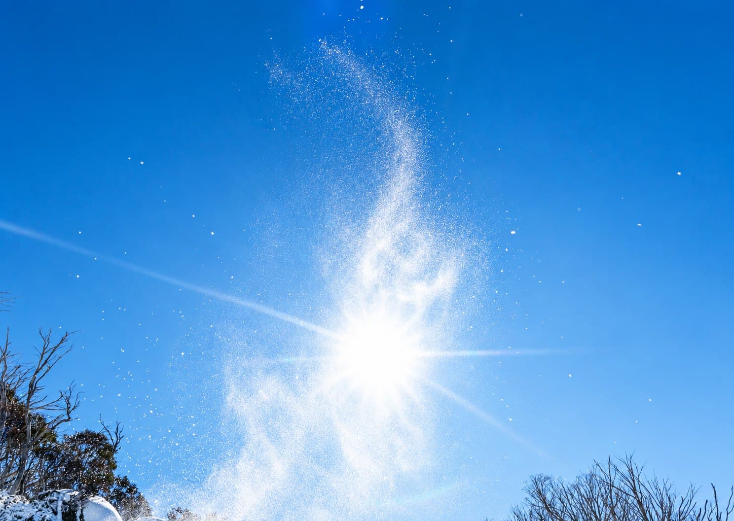 Blue sky over a snowy Thredbo ridge